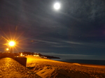 FZ010568 Moon as bright as streetlamp at Exmouth beach.jpg